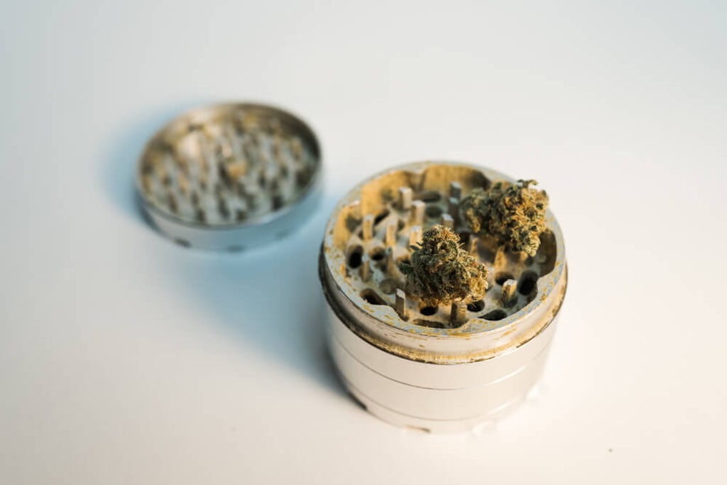 Cannabis in a multi-chamber grinder